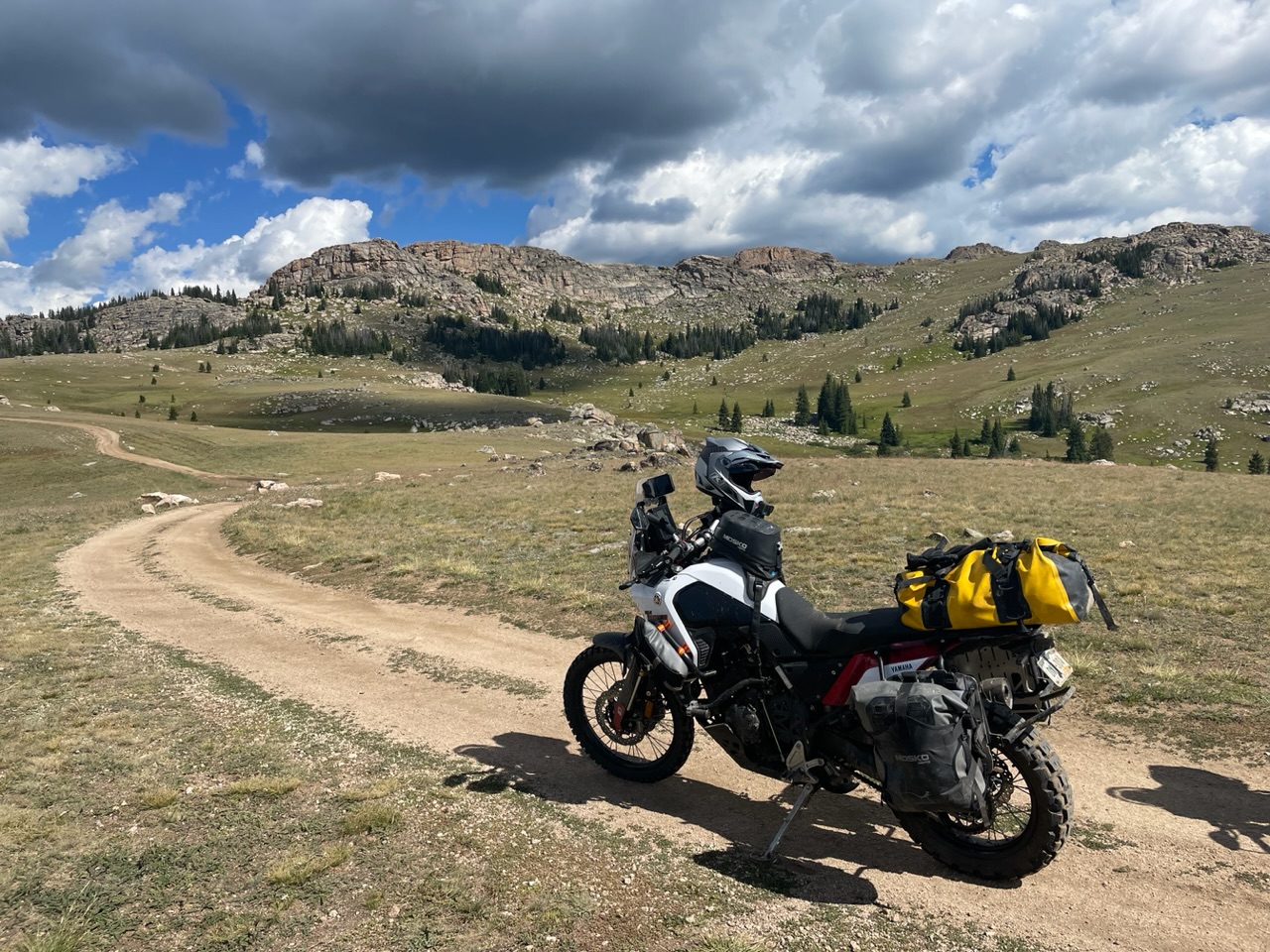 Yamaha T7 Tenere dirt road mountains blue sky