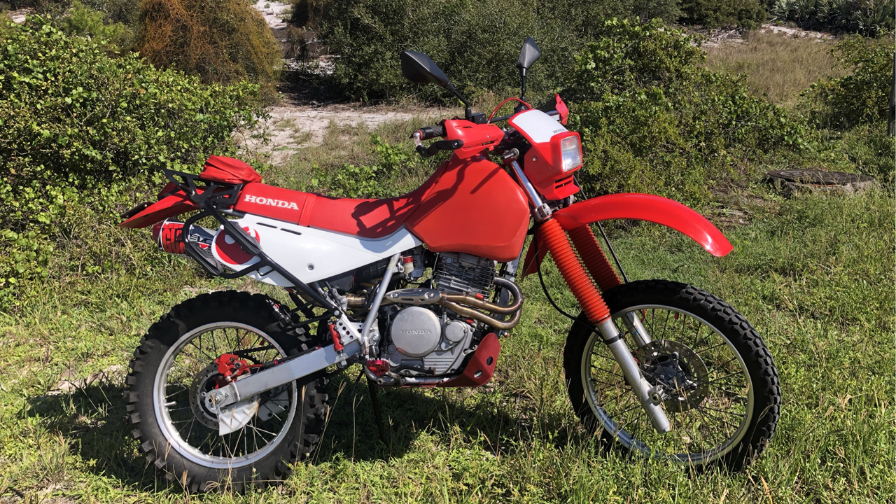 Honda XR650L ocean sand beach grass